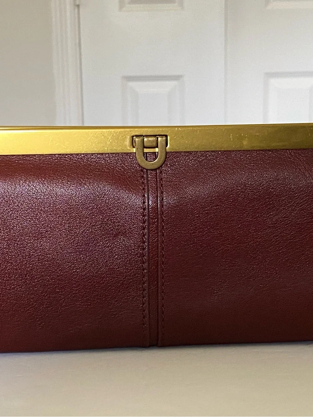 Fossil Burgundy Red Brown Sleek Leather Clutch Wallet with Gold Accent NEW